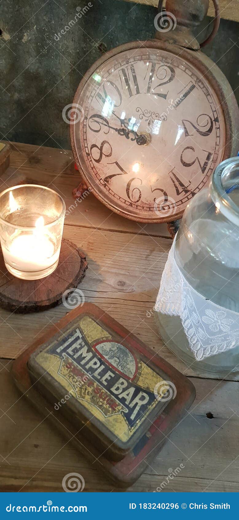 Table with Vintage Clock, Jar, Box and Candle. Editorial Photo Image
