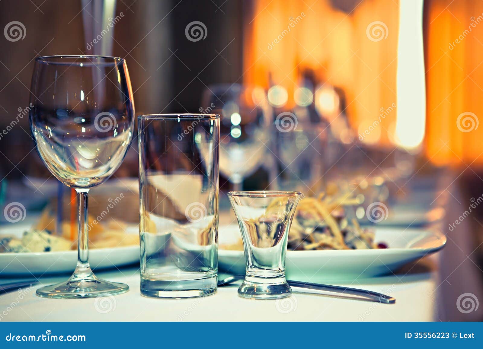 Table wine glasses stock image. Image of orange, plate 35556223