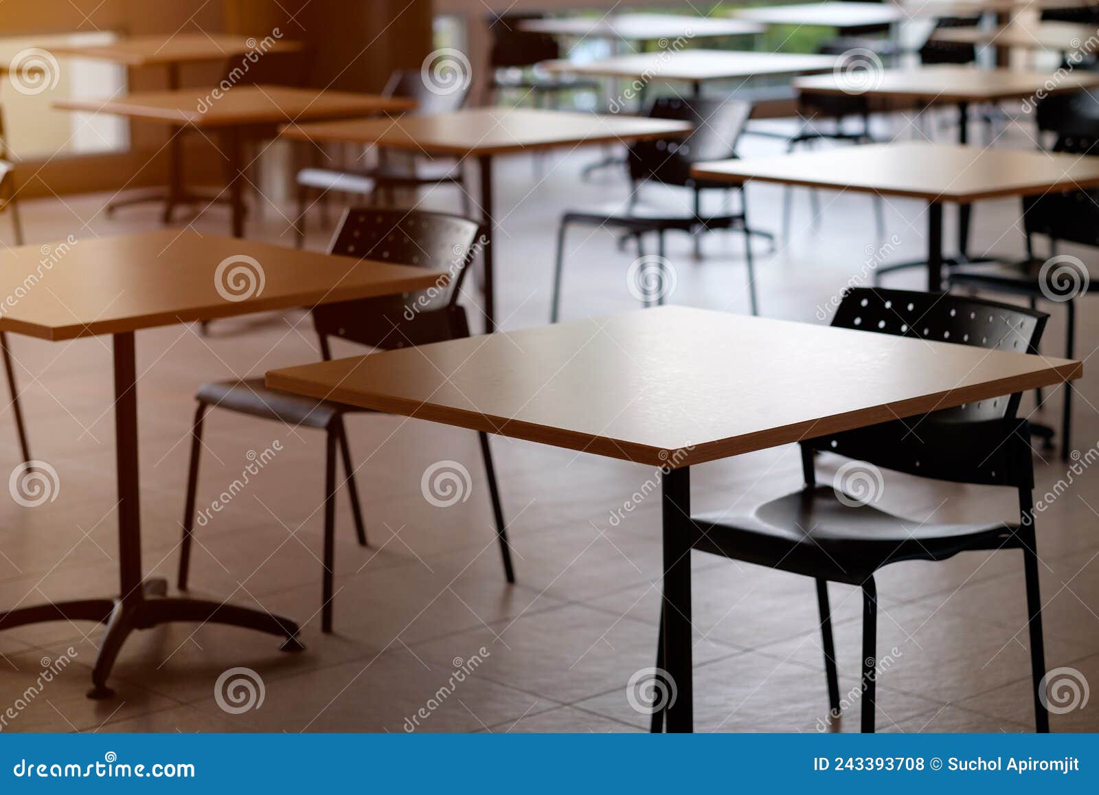 Tables and Chairs that is Arranged Spaced or Social Distancing in the