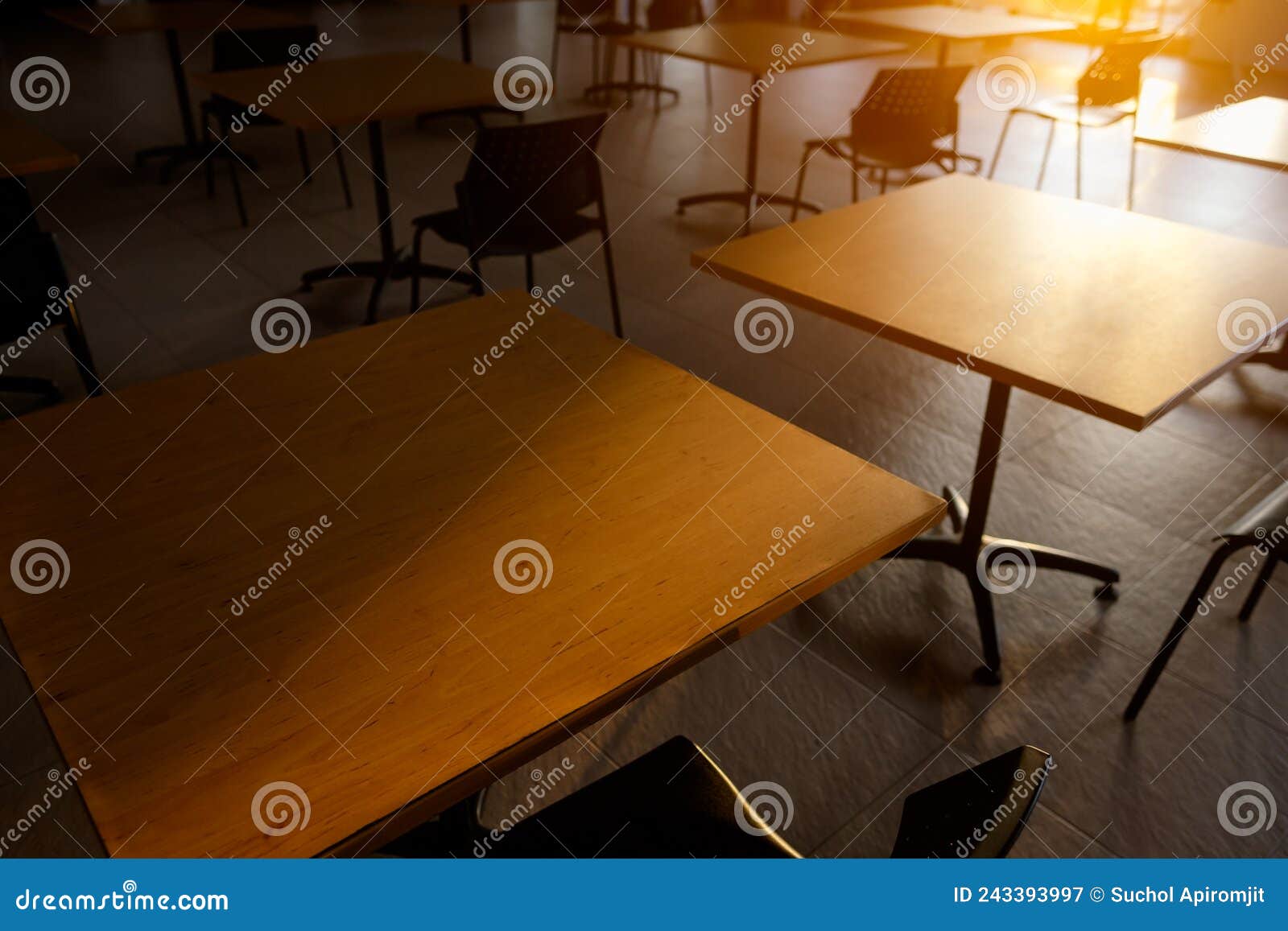 Tables and Chairs that is Arranged Spaced or Social Distancing in the