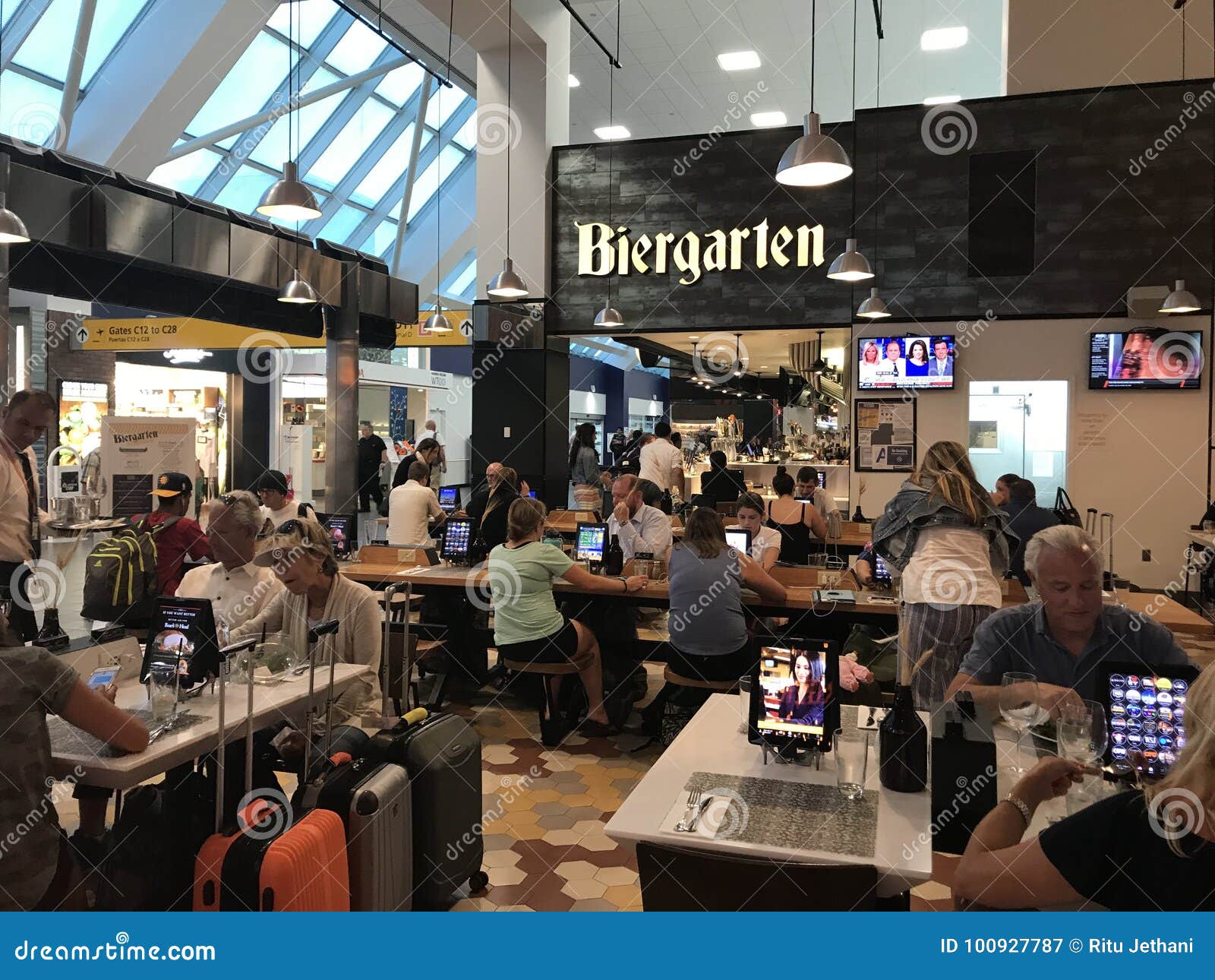 Tables in Food Hall, LaGuardia Airport, New York City, NY Editorial
