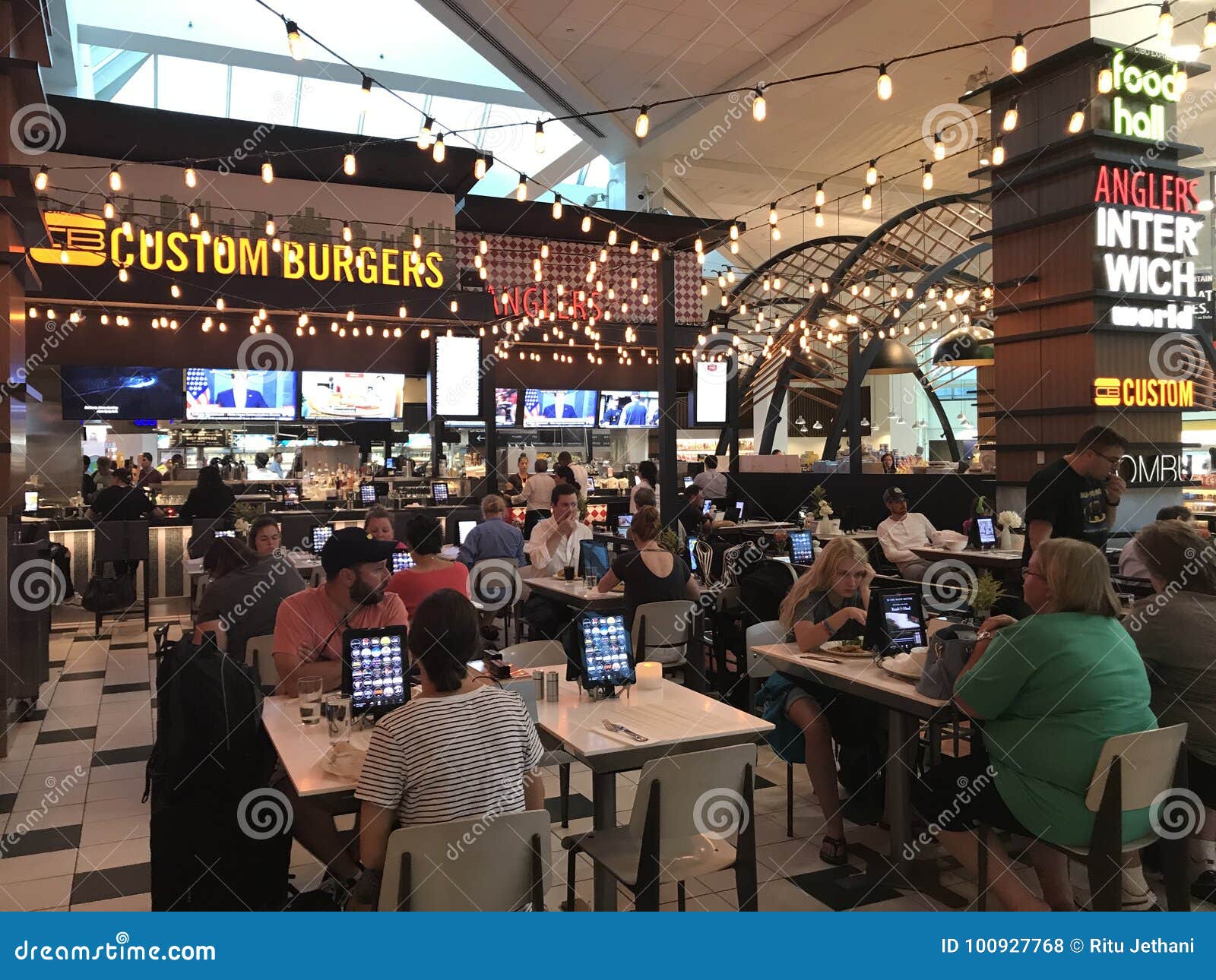 Tables in Food Hall, LaGuardia Airport, New York City, NY Editorial
