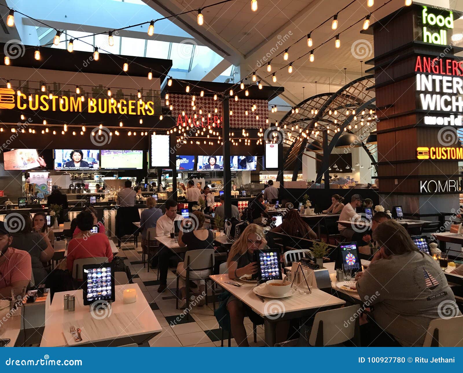 Tables in Food Hall, LaGuardia Airport, New York City, NY Editorial
