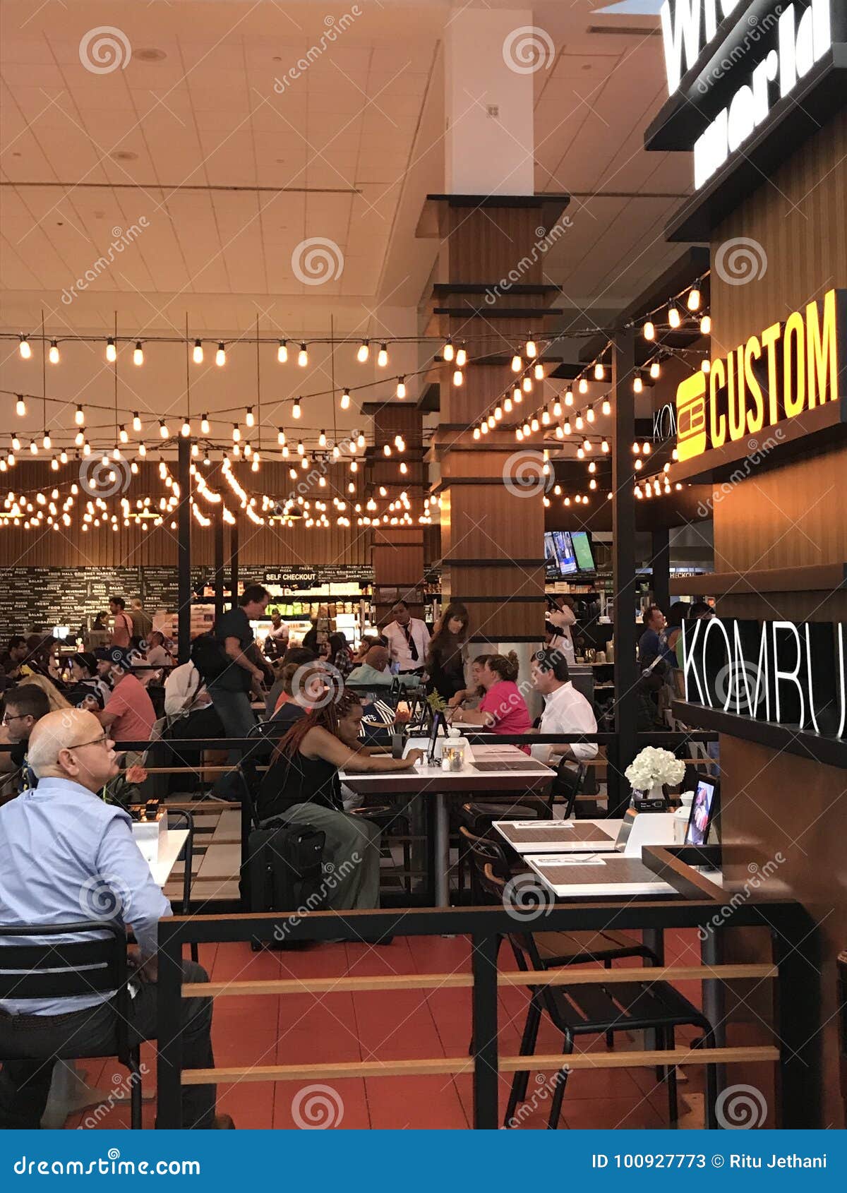 Tables in Food Hall, LaGuardia Airport, New York City, NY Editorial