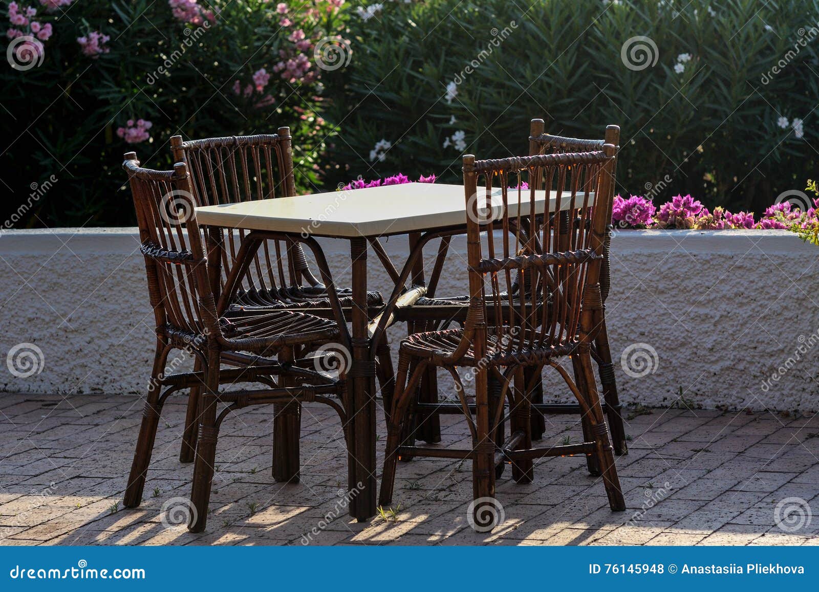 Tables and Wicker Chairs in the Restaurant in Italy Stock Photo Image