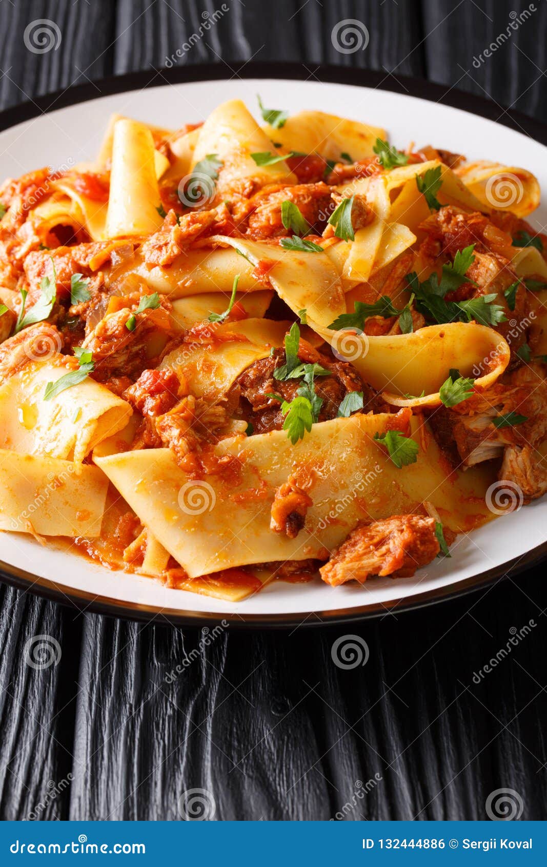 taccozzette con stracotto pasta with braised pork ragu close-u