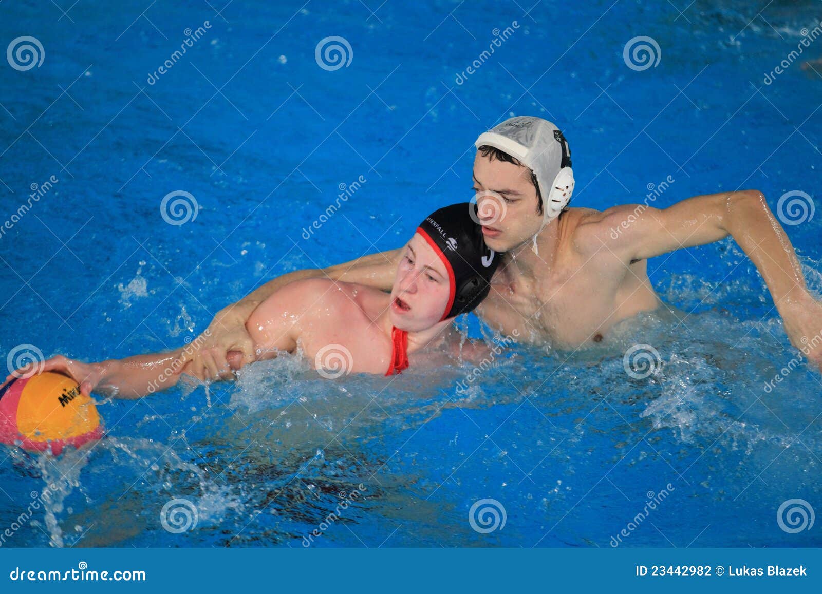 Tackle in water polo editorial photography. Image of league 23442982