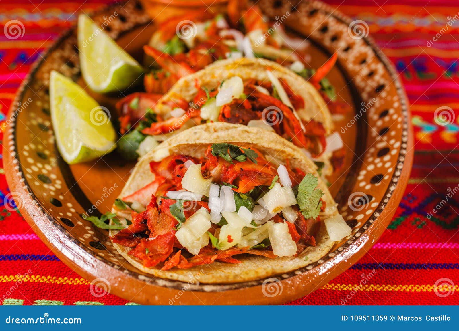 tacos al pastor and lemon mexican spicy food in mexico city