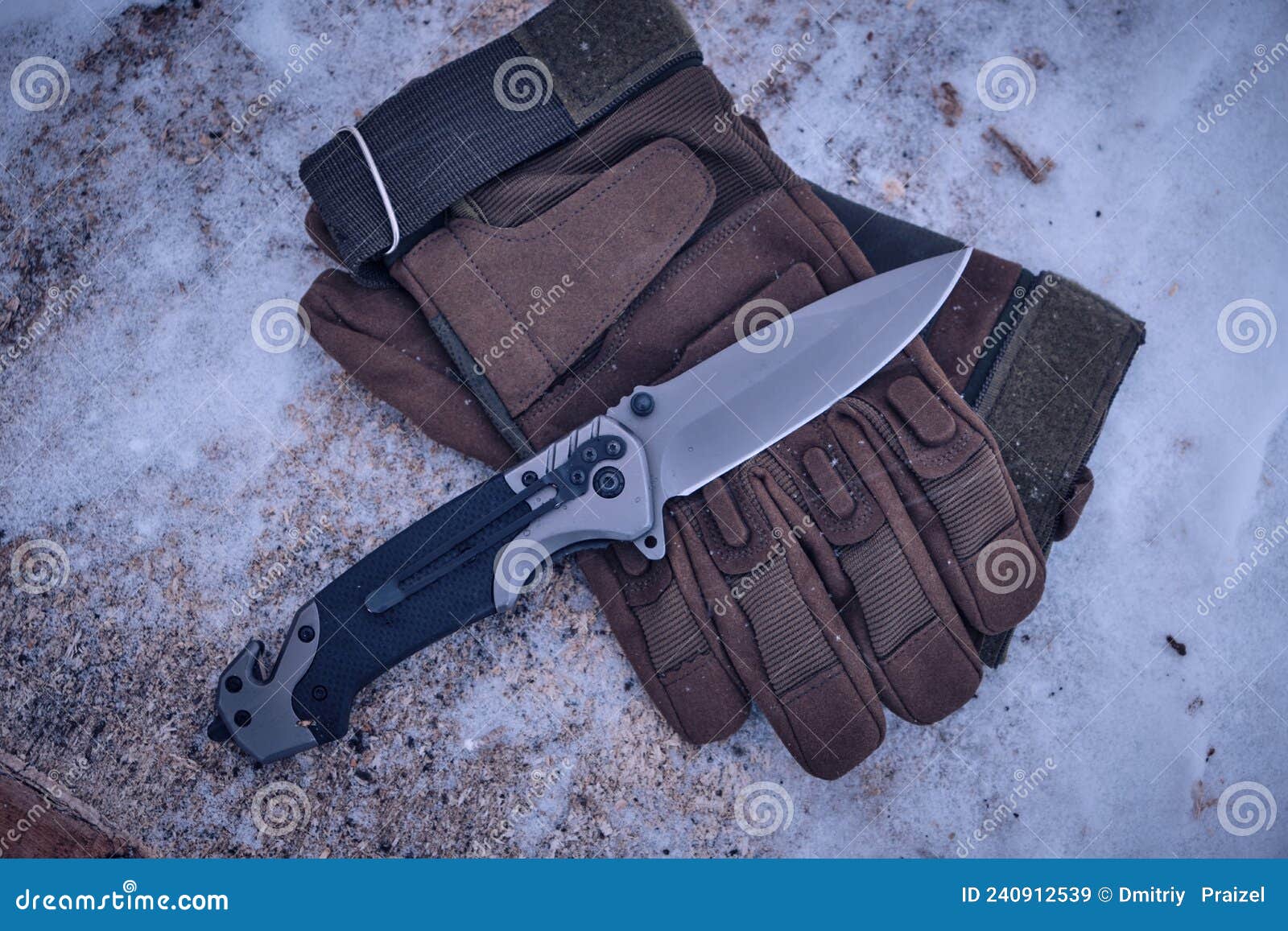 Tactical Gloves and a Folding Knife in the Snow Stock Image Image of