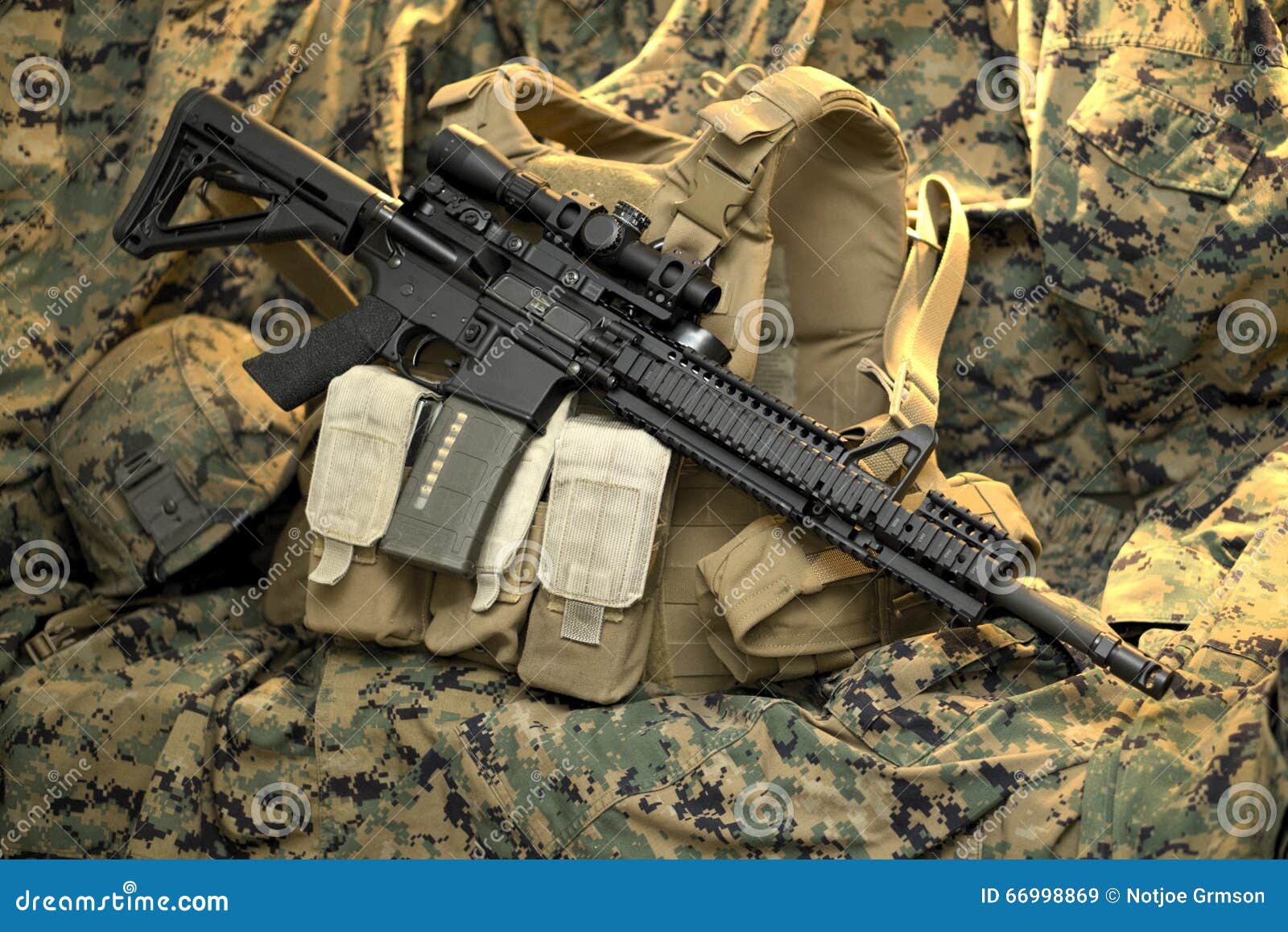 tactical rifle resting on vest