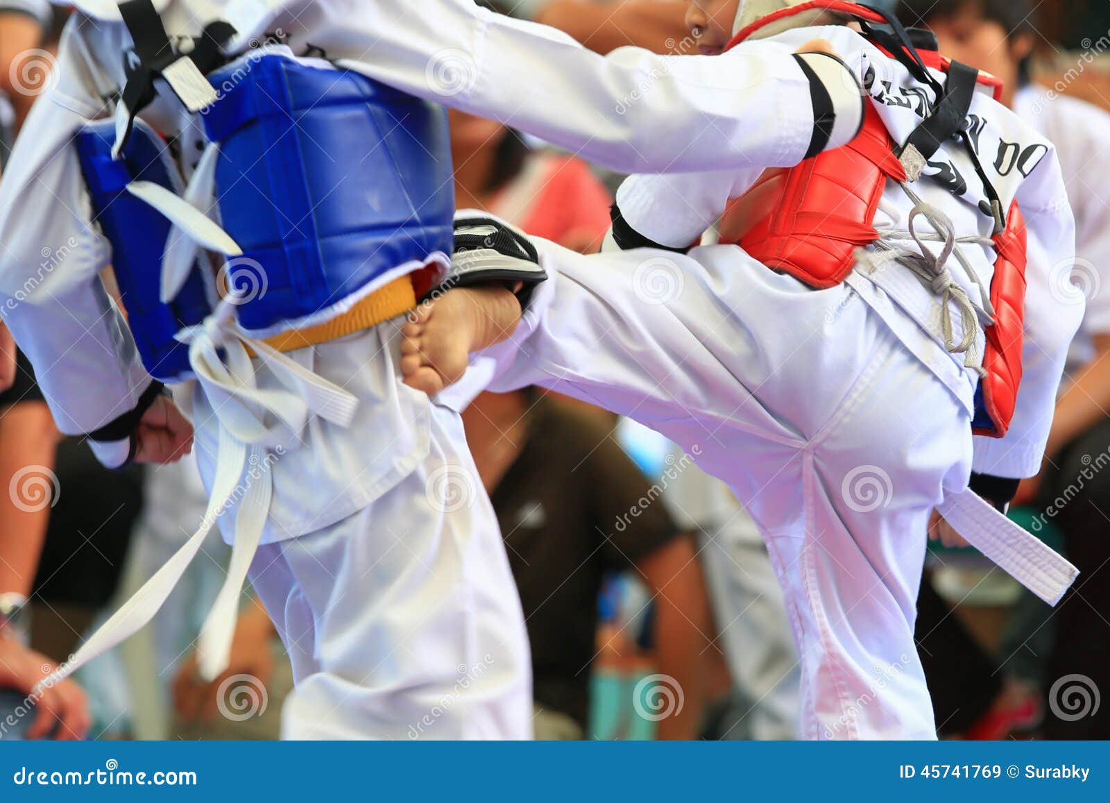 taekwondo athletes fighting on stage
