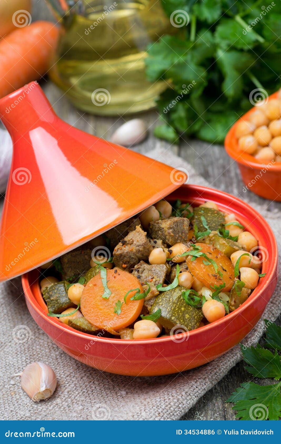 Tagine with Beef, Chickpeas, Vegetables and Herbs, Closeup Stock Photo