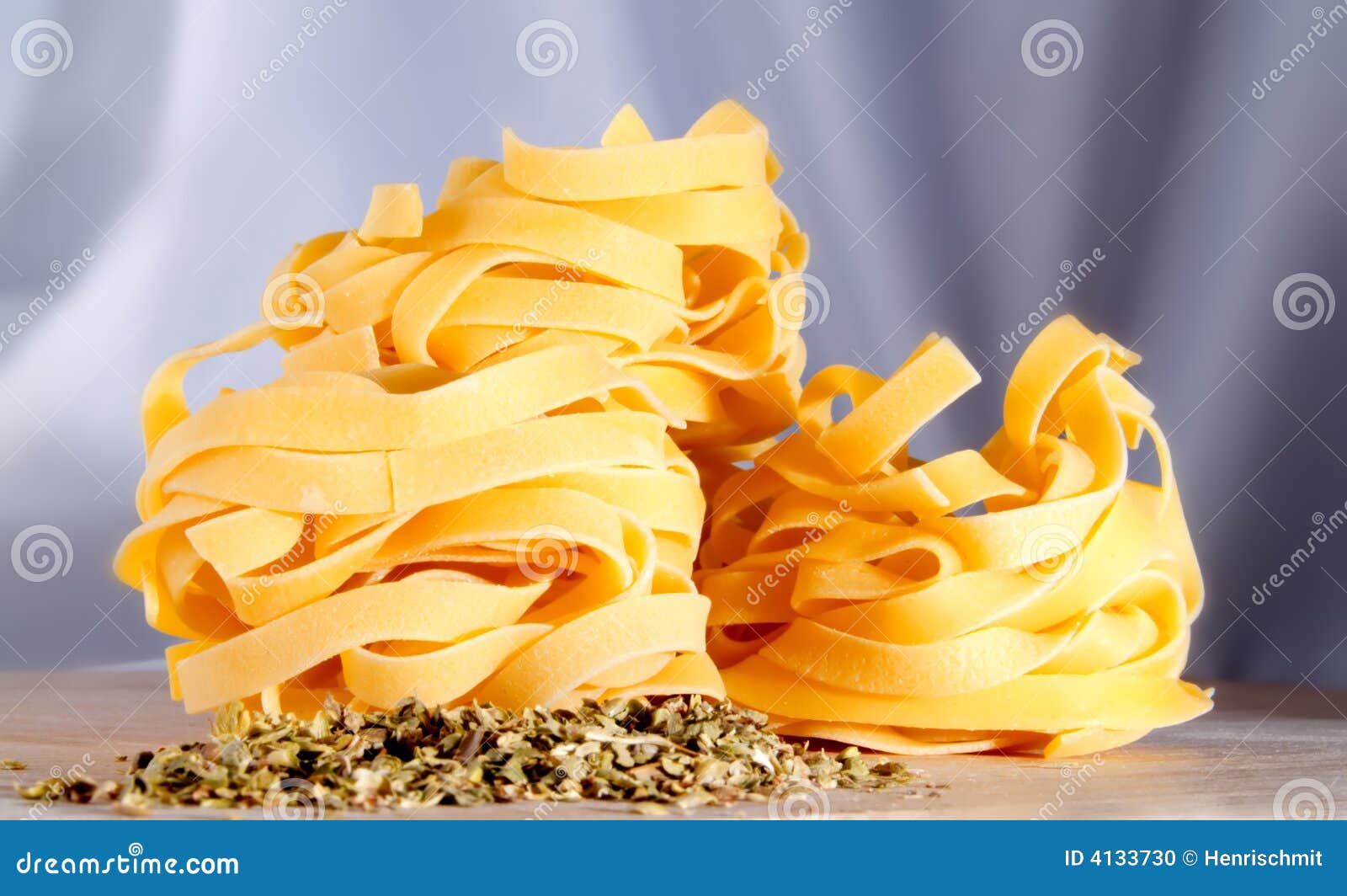 tagliatelle and herbs in a kitchen