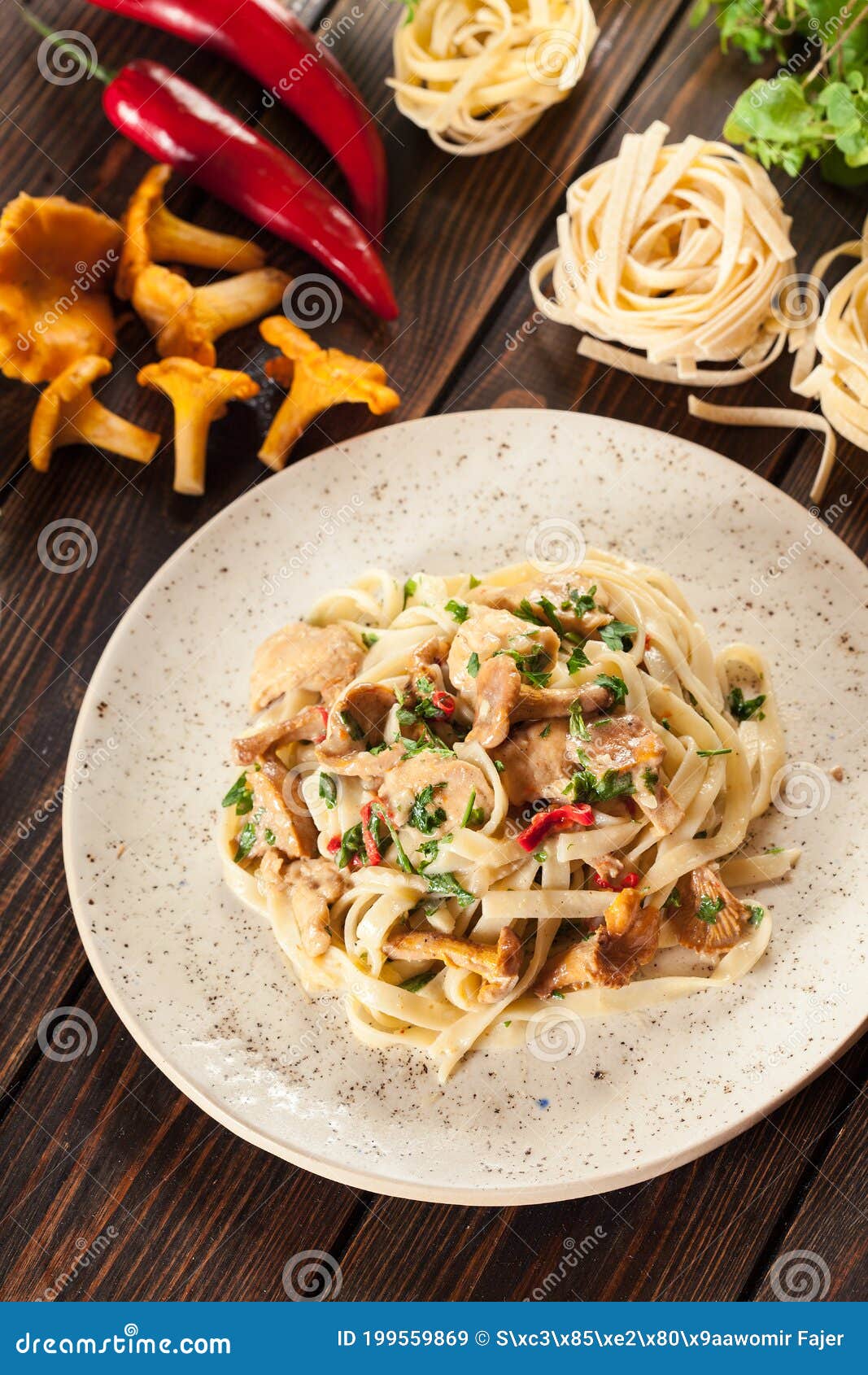Tagliatelle Pasta with Chicken and Chanterelles Mushrooms Stock Image