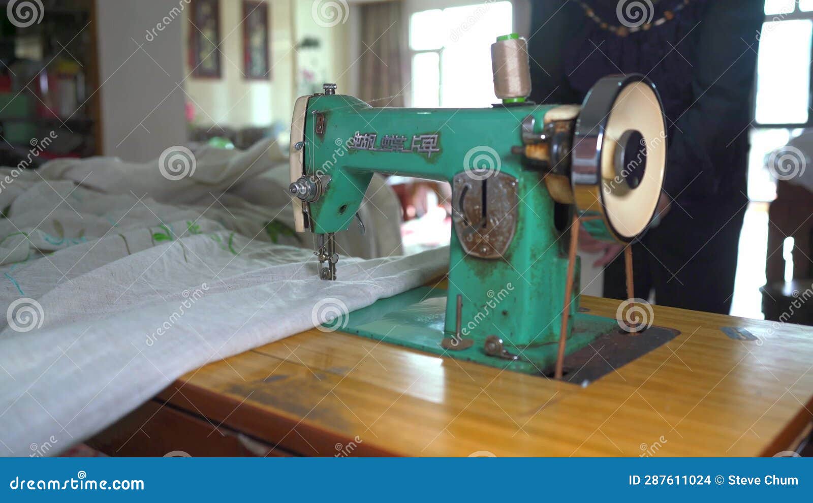 A Tailor Sews Curtains Using a Traditional Sewing Machine Stock Footage Video of sewing, sews