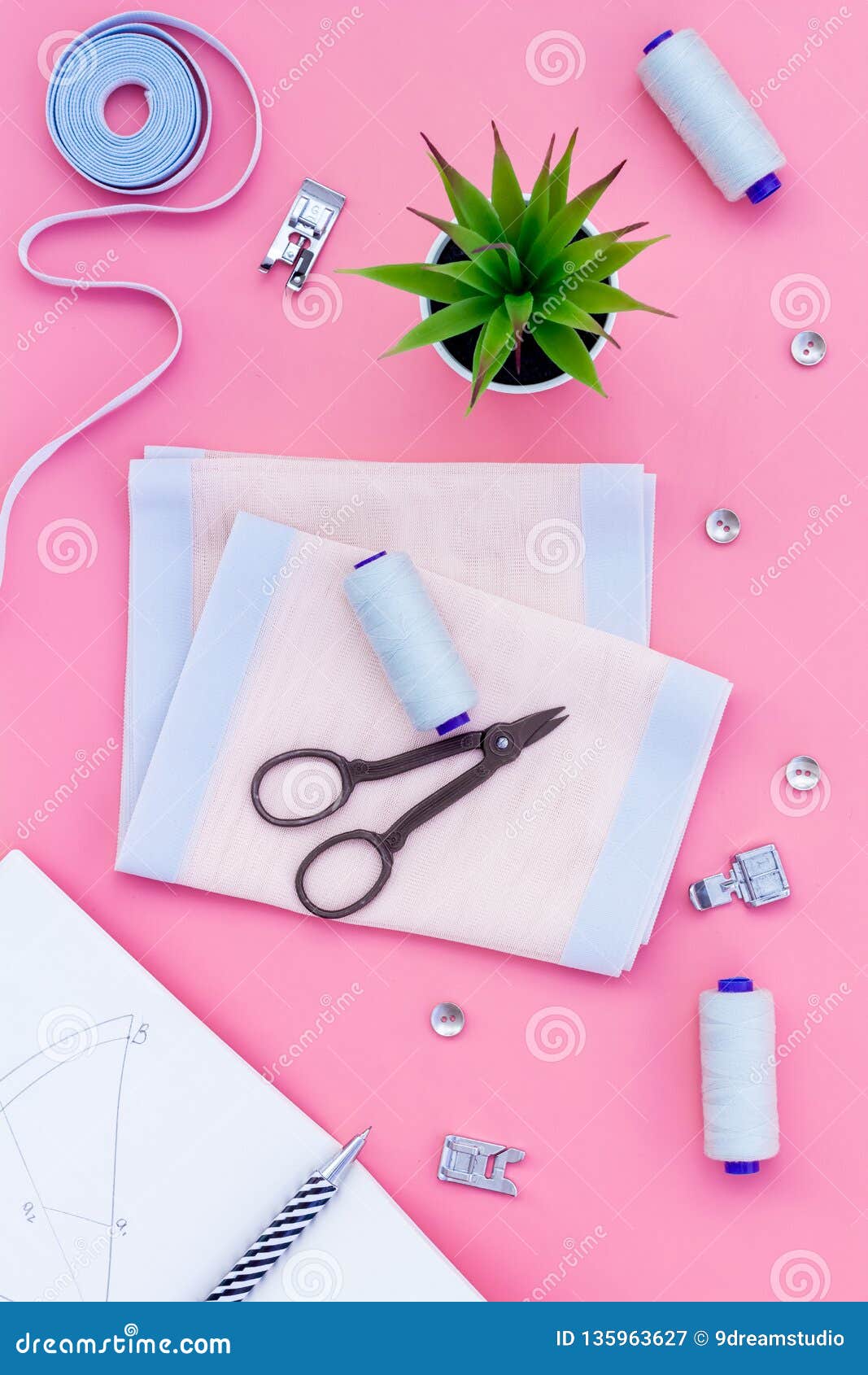 Tailor Work Place with Thread, Scissors, Fabric. Sewing As Hobby. Pink