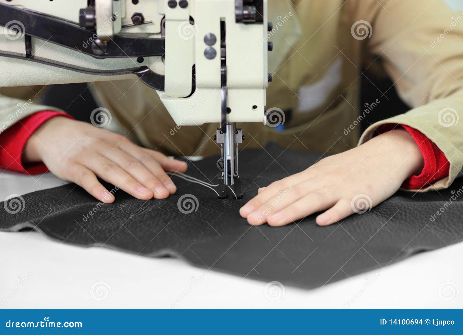 Tailor Working on a Sewing Machine at Factory Stock Photo Image of