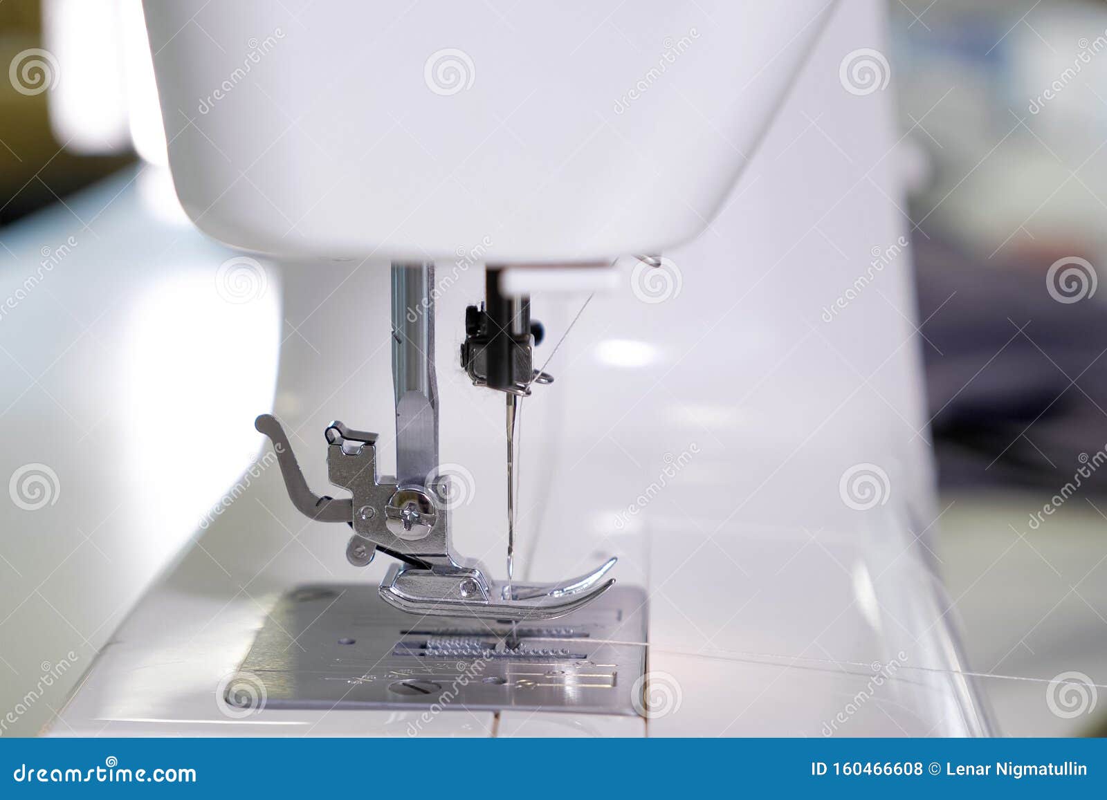 Needle in sewing machine stock photo. Image of craft 160466608