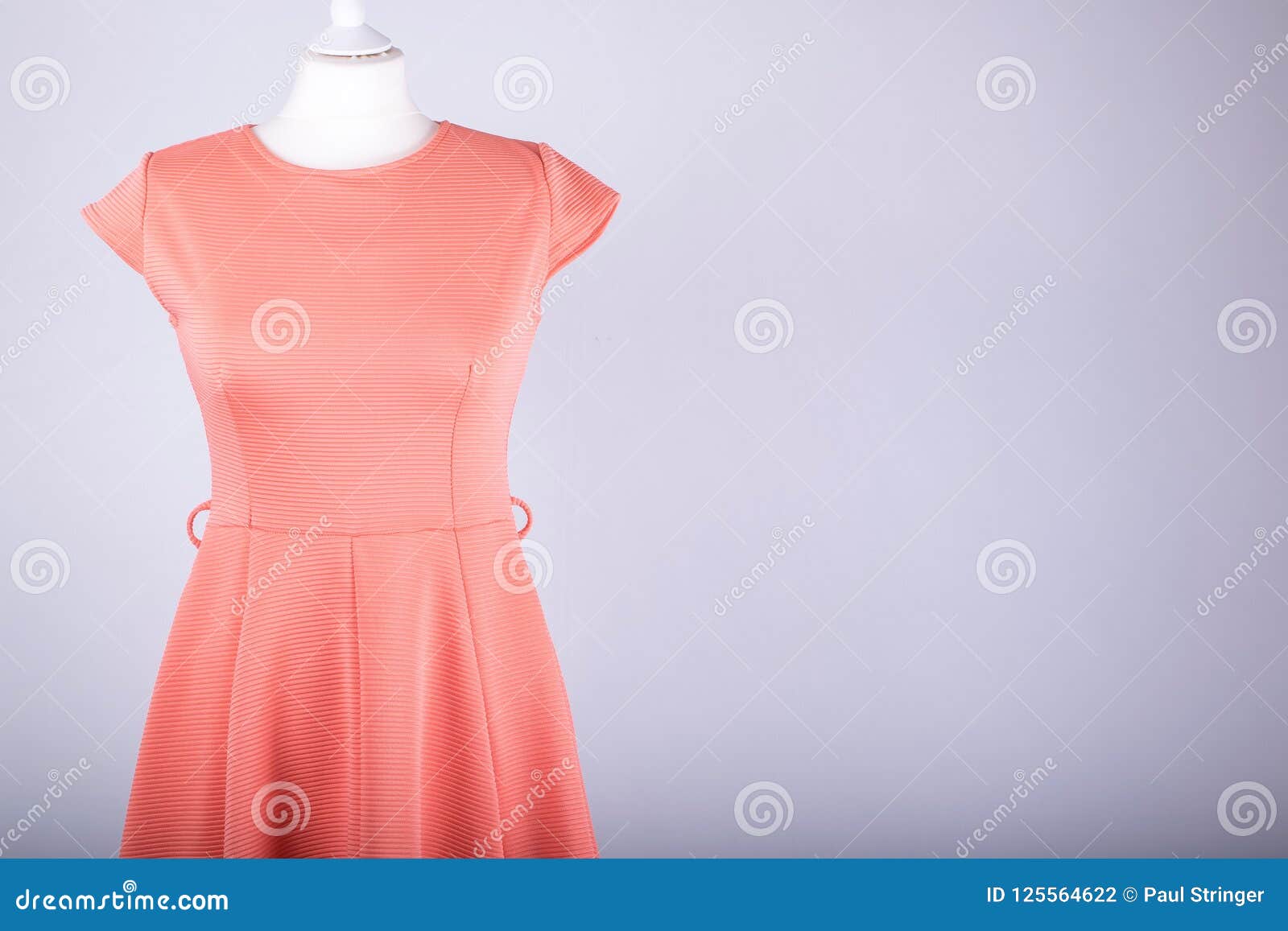 Tailors Mannequin Dressed in an Orange Dress Stock Photo - Image of ...