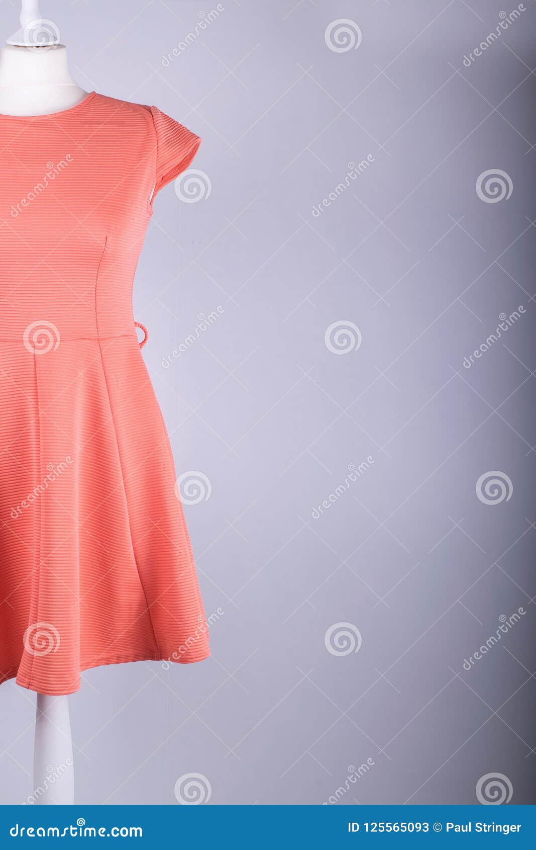 Tailors Mannequin Dressed in an Orange Dress Stock Image - Image of ...