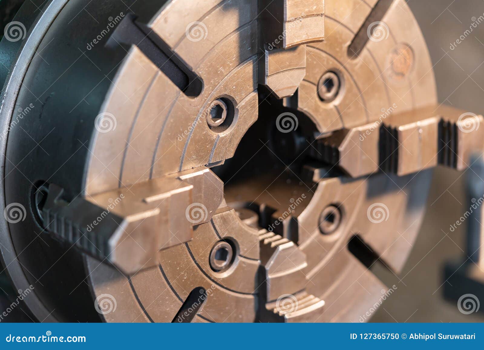 The Tailstock of a Metal Work Lathe Close Up Shot. Turning High Precision Automotive Part by