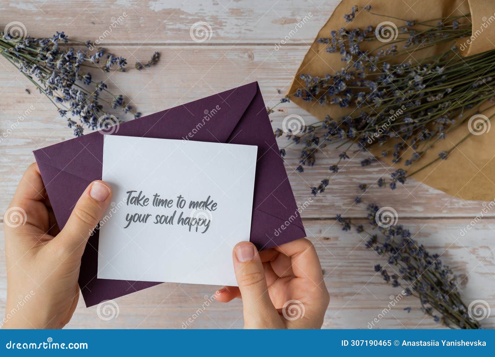 take time to make your soul happy text on supportive message paper note reminder from green envelope. flat lay