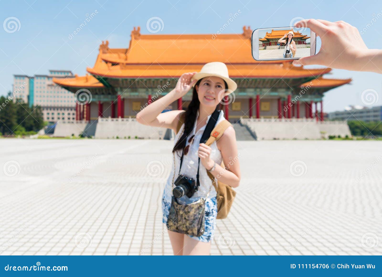 Modern Asian Teem Taking Photos In Front Of Chiang Kai Shek Memorial Hall Joyfully Standing Like A Model Wearing Short Clothes On A Side View Modern Asian Teem Taking Photos In Front Of Chiang Kai Shek Memorial Hall Joyfully Standing Like A Model Wearing Short Clothes On A Side View