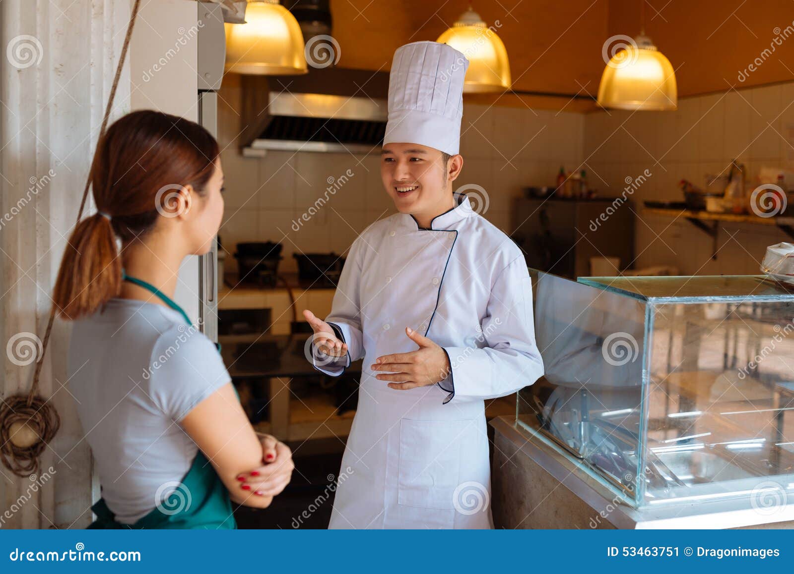 Talking employees stock image. Image of kitchen, uniform 53463751