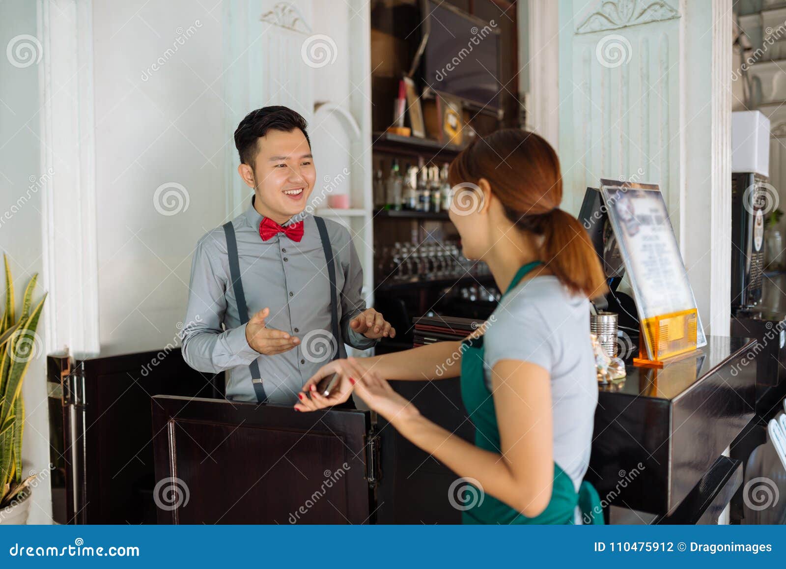 Talking restaurant staff stock photo. Image of barman 110475912