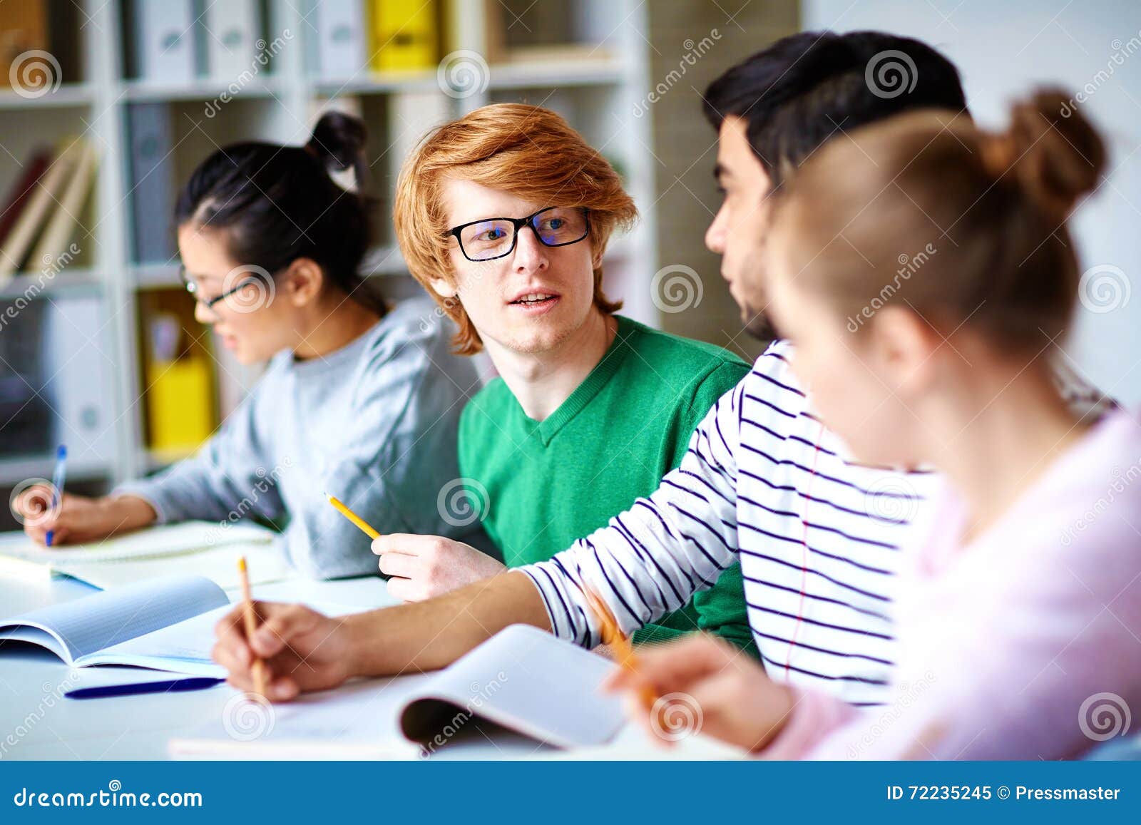 Talking to group-mates stock image. Image of people, note - 722352451300 x 957