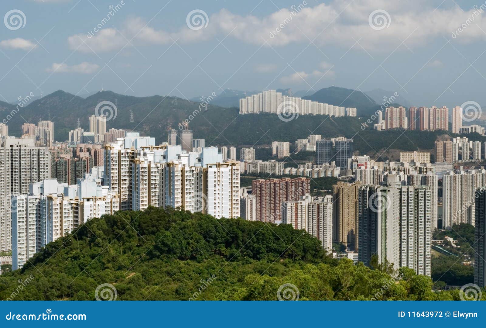 Tall Apartments with Green Mountain and Blue Sky Stock Photo Image of