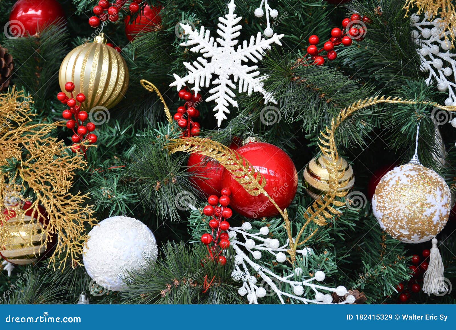 Tall Christmas Tree with Decorations Like Hanging Balls and Snow ...