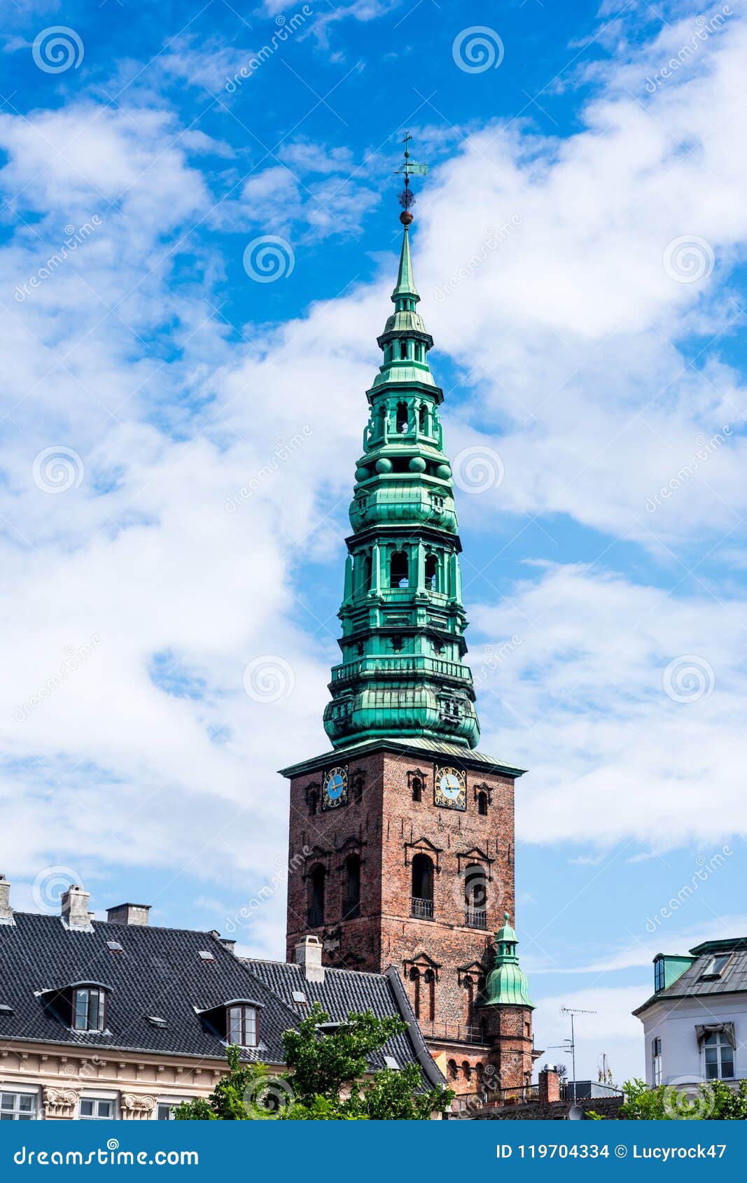 A Tall Clock Tower, Church in Copenhagen, Denmark Stock Photo - Image ...