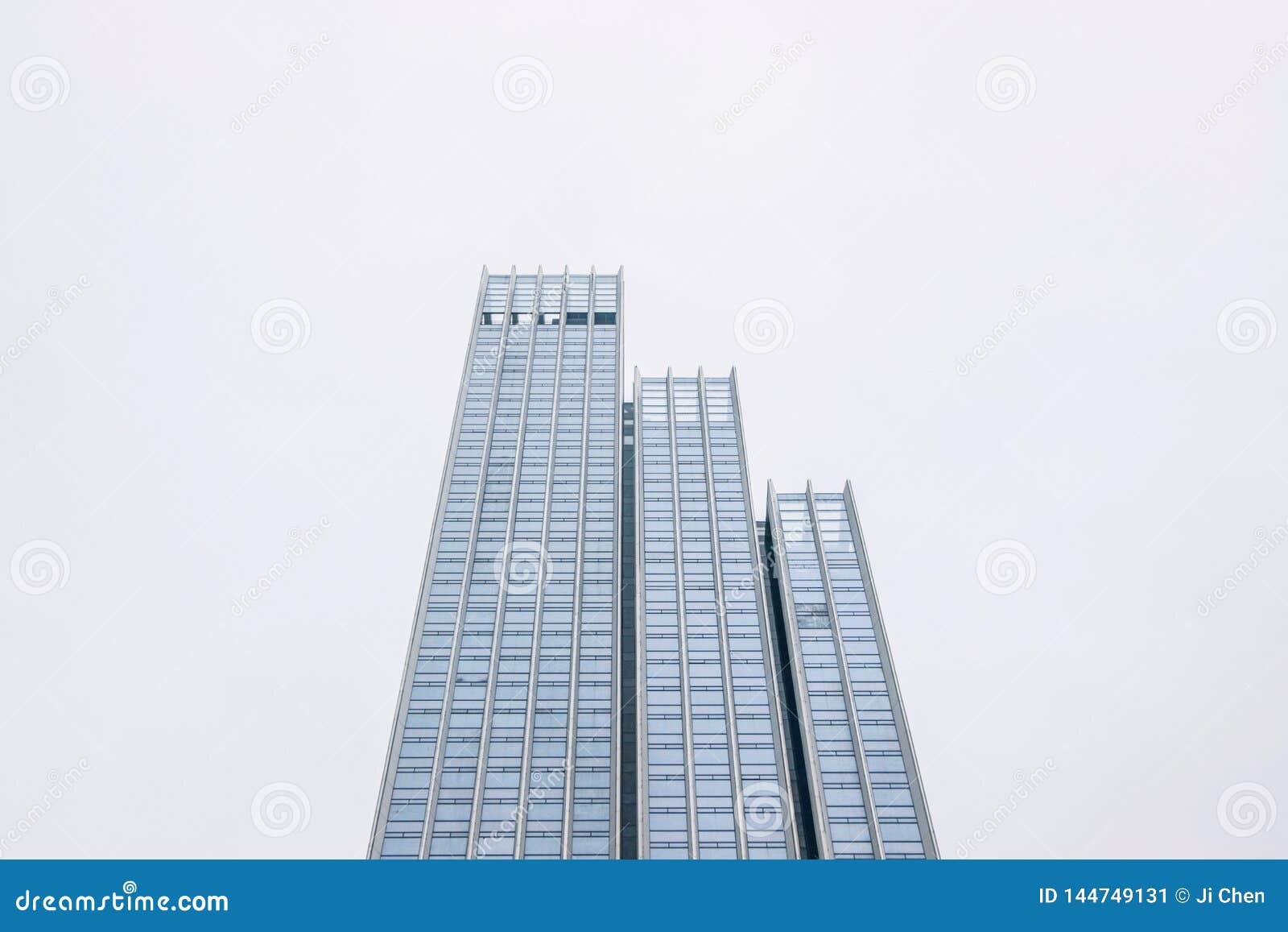 Tall glass building in sky stock image. Image of window 144749131