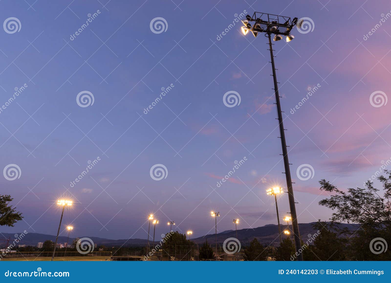 Tall Stadium Light Pole Over a Baseball Field at Sunset Stock Image Image of shine, pole