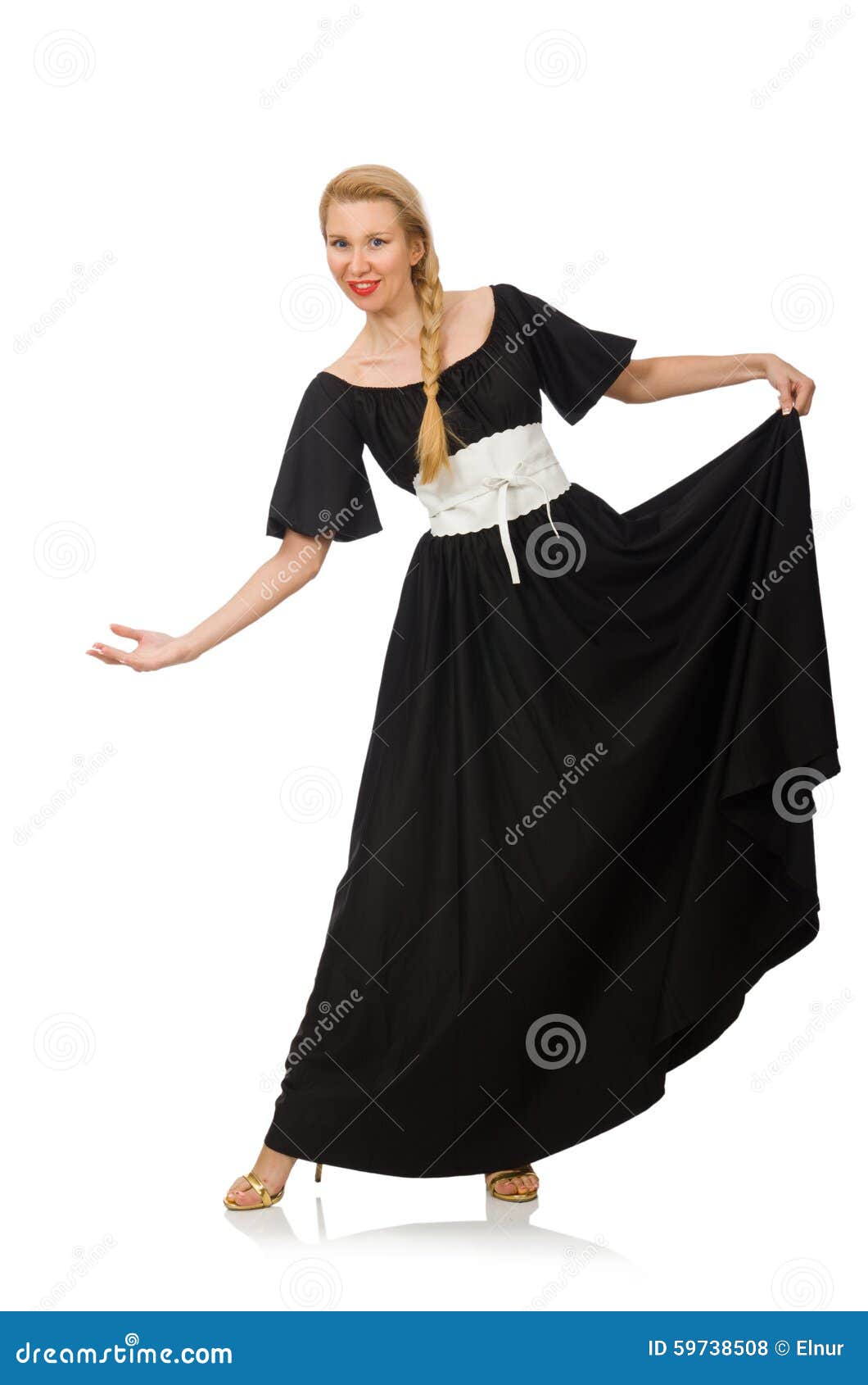 The tall woman in long black dress isolated on white