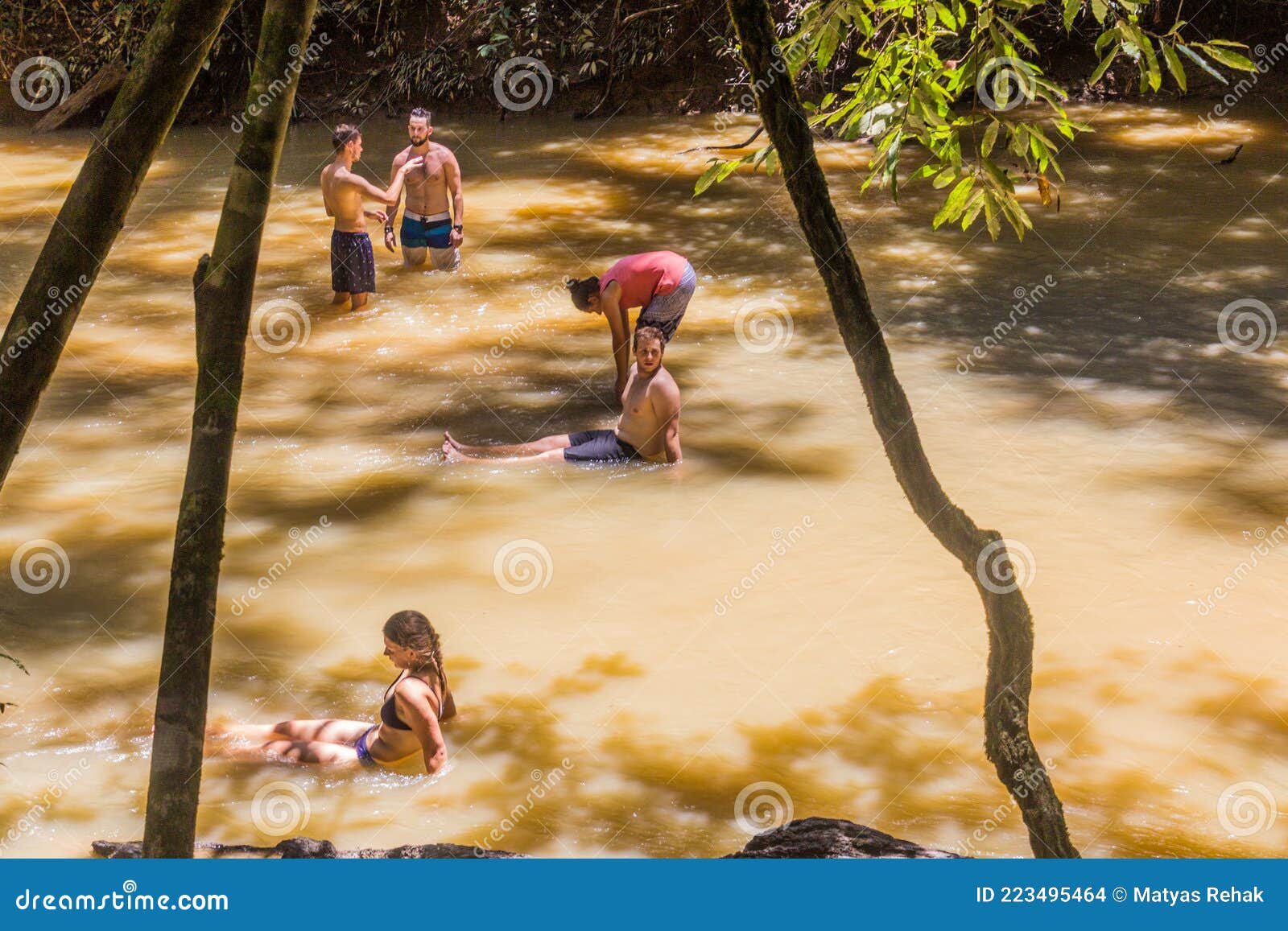TAMAN NEGARA, MALAYSIA - MARCH 17, 2018: Tourists are Swimming in a