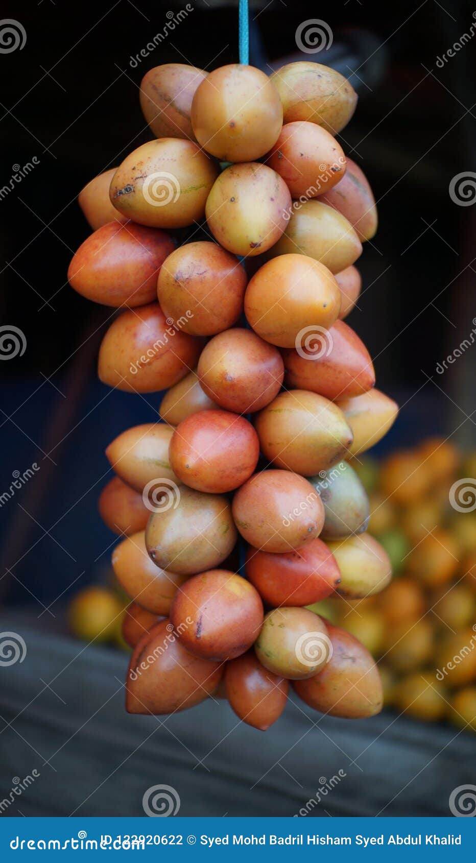 tamarillo or terung belanda hanging at stall in medan indonesia