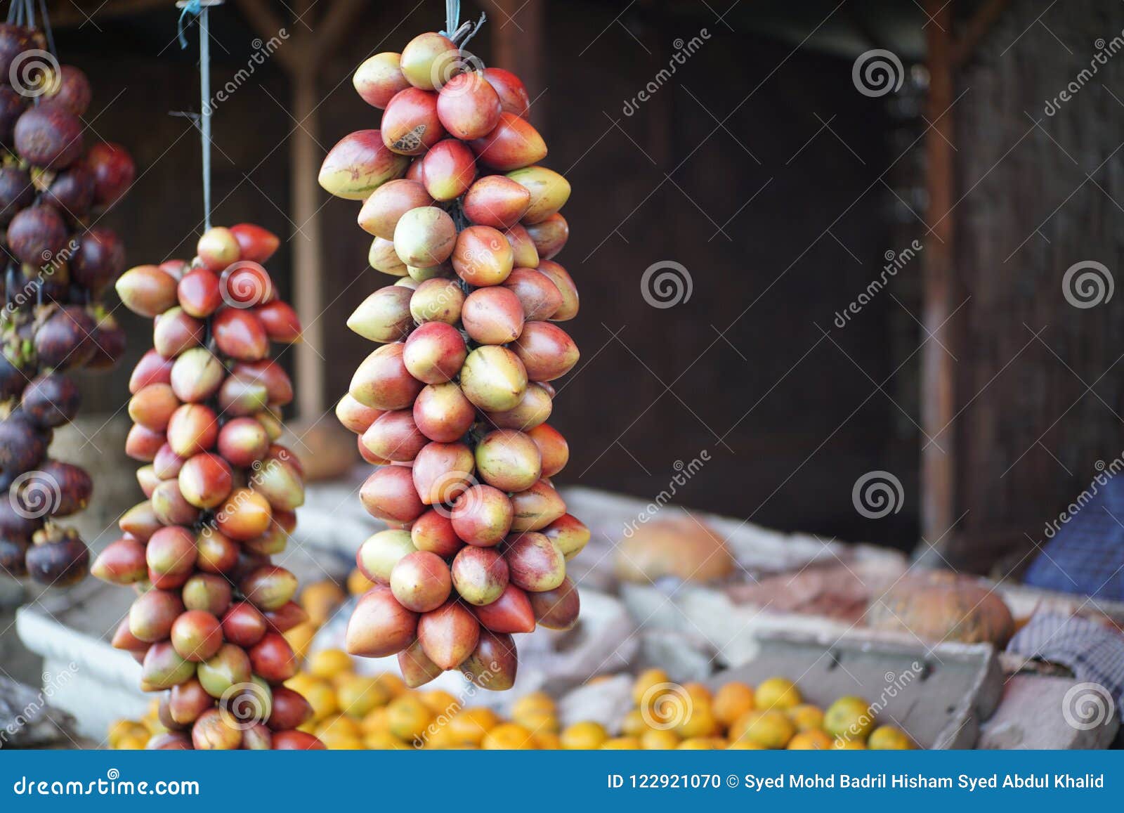 tamarillo or terung belanda hanging at stall in medan indonesia