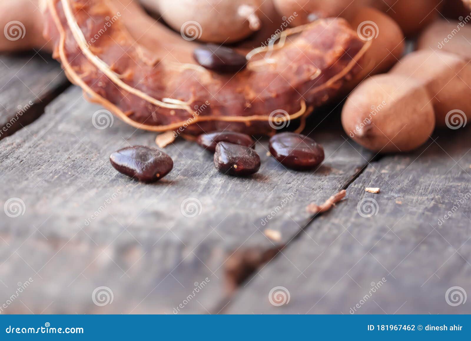 Tamarind Fruit With Seed On Black Wooden Background Top View Flat Lay Tamarind Fruits And Tamarind Seeds Selective Focus Stock Photo Image Of Focus Leaf