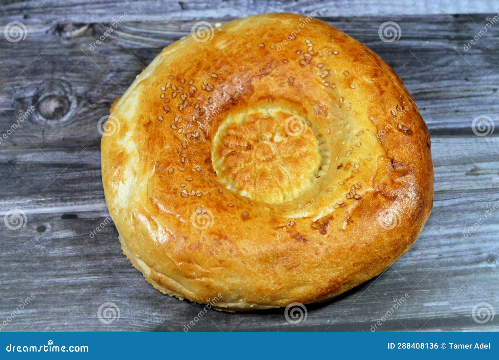 tandyr nan uzbek bread, a type of central asian bread, often decorated by stamping patterns on the dough by using a bread stamp