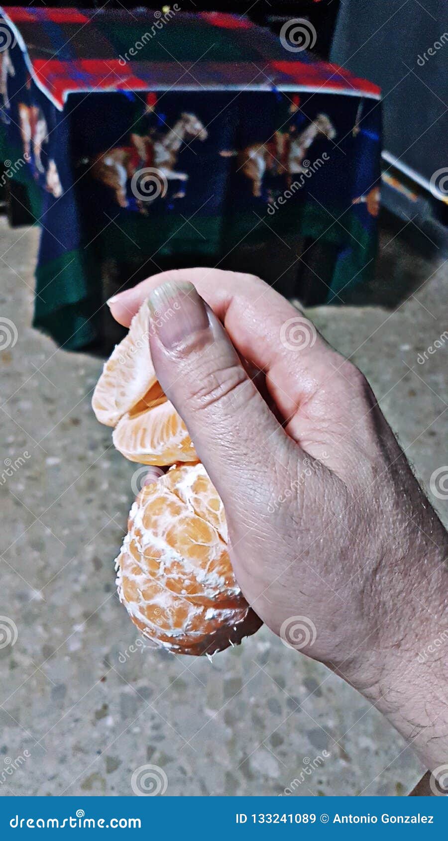 tangerines in hand