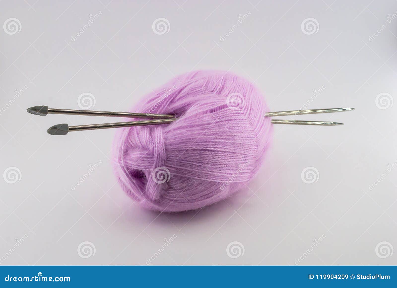 Tangle and Knitting Knitting on a White Background Handmade Stock Image