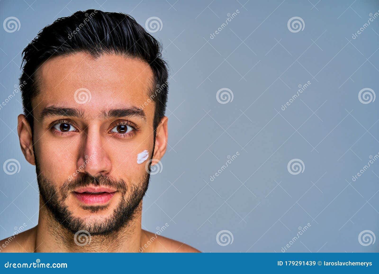 Closeup Positive Guy with a Black Beard with White Spot of Cream on His  Cheek. Cosmetics Concept Stock Image - Image of spot, camera: 179291439