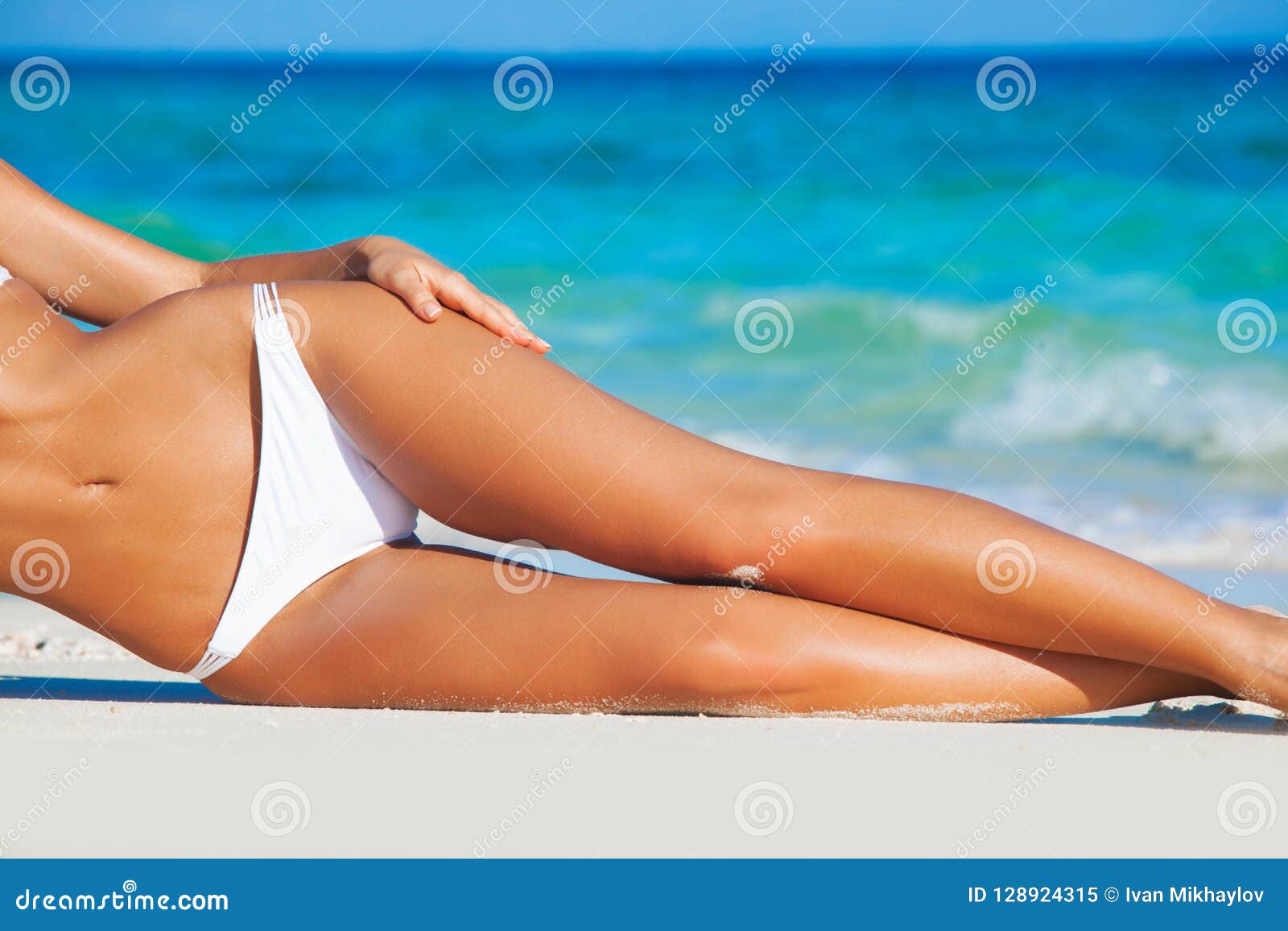 Nude Girl Sun Tanning On Beach