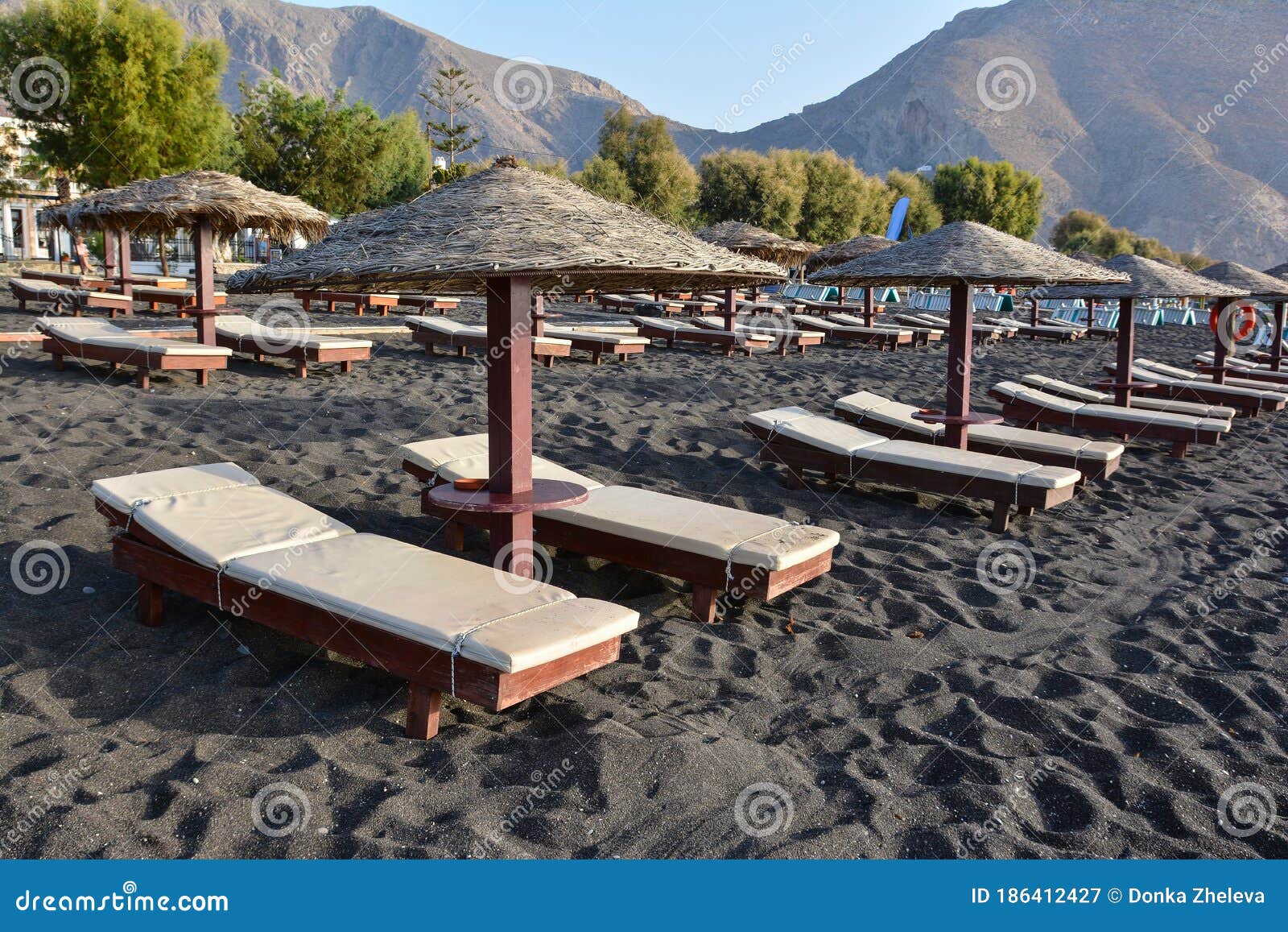 Tanning Beds and Umbrellas on Perissa Beach, Santorini, Greece Stock Image Image of relax