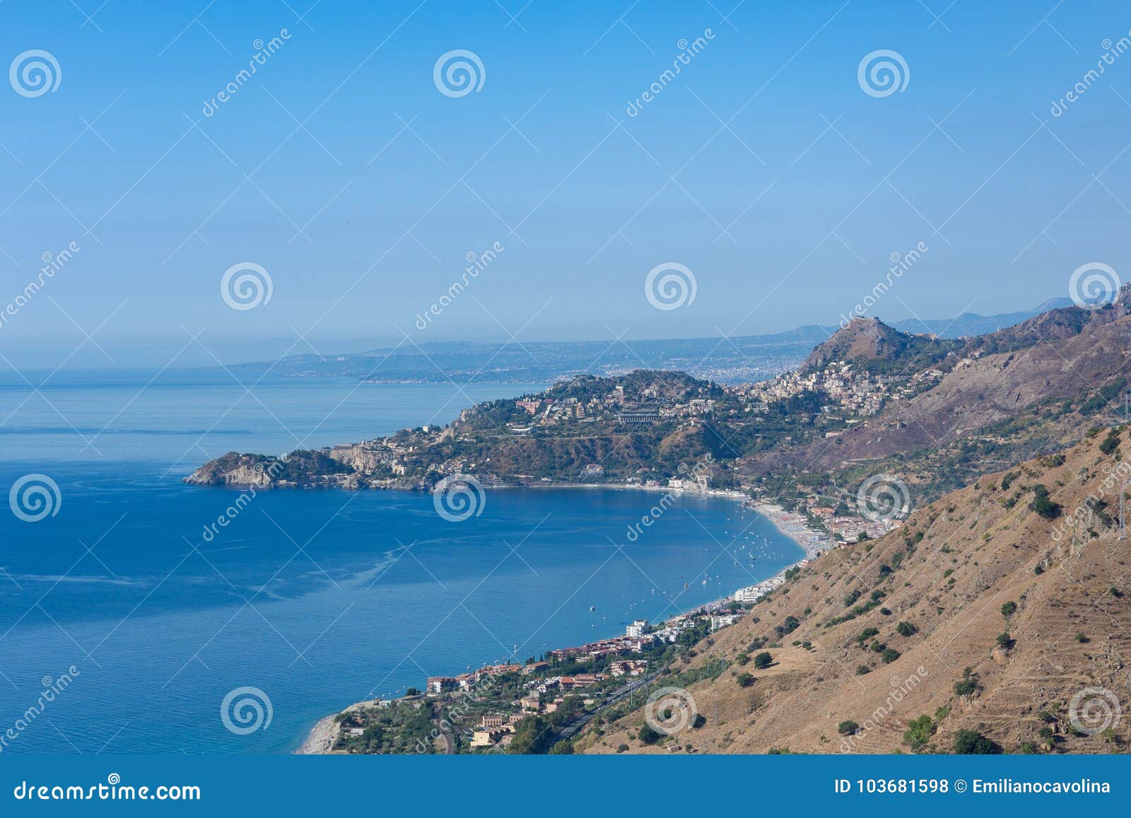 taormina bay in a summer day seen from forza d`agrÃÂ², sicily