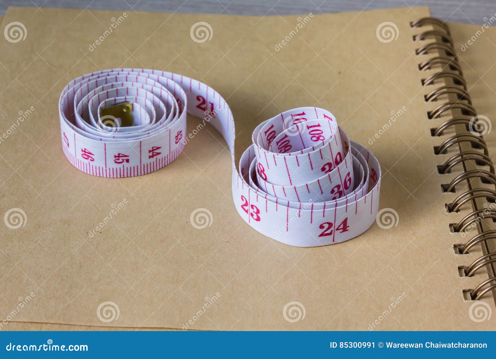 Tape Measure on Blank Note Paper or Memo Note for Concept of we Stock