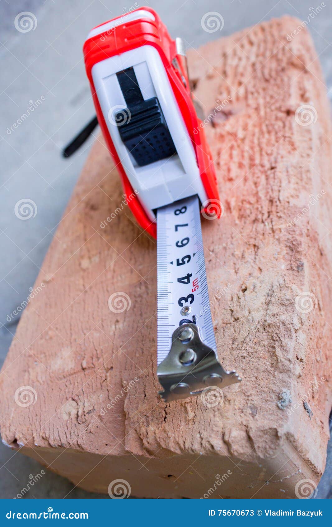 Tape measure on the brick stock image. Image of equipment 75670673