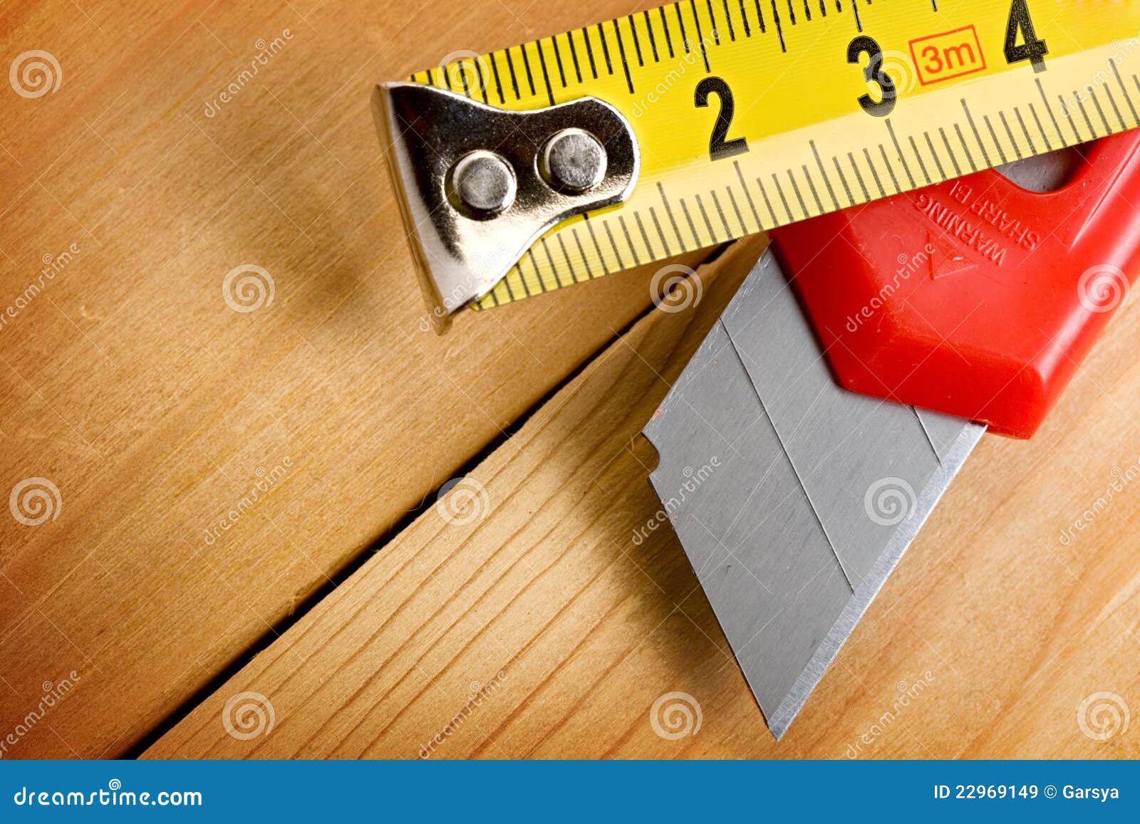 Tape measure and knife stock image. Image of millimeter 22969149